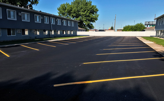 newly striped parking lot by Straightline, Inc.